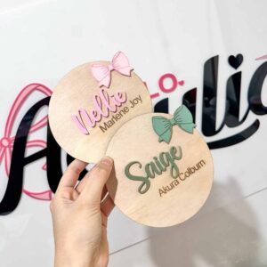 engraved wood with acrylic detailing, personalised baby announcement plaque bow theme.