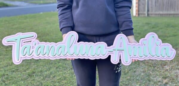 A triple layer acrylic name sign, personalised with a 3D effect, offering a unique and eye-catching decorative piece.