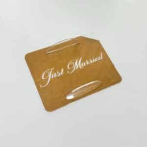 Acrylic cake topper set with cursive "Just Married" design, for a Tiramisu themed wedding. Personalised cake decoration.