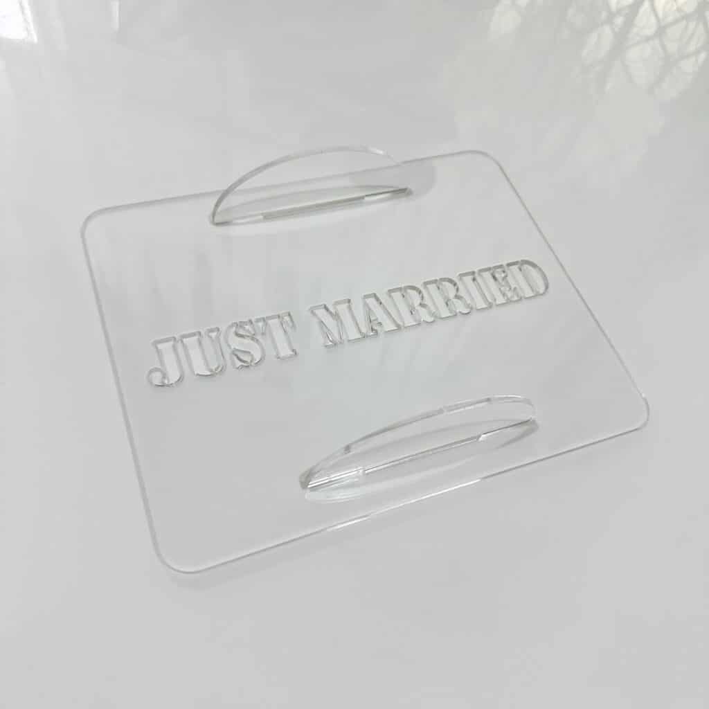 Acrylic cake stencil set for a Tiramisu "Just Married" cake, featuring a custom, handcrafted design.