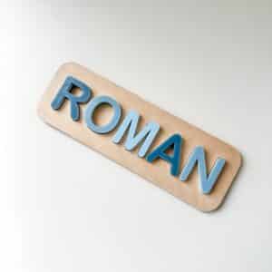 A custom, handcrafted, wooden and layered acrylic name puzzle for kids, featuring a personalisation option for a special.